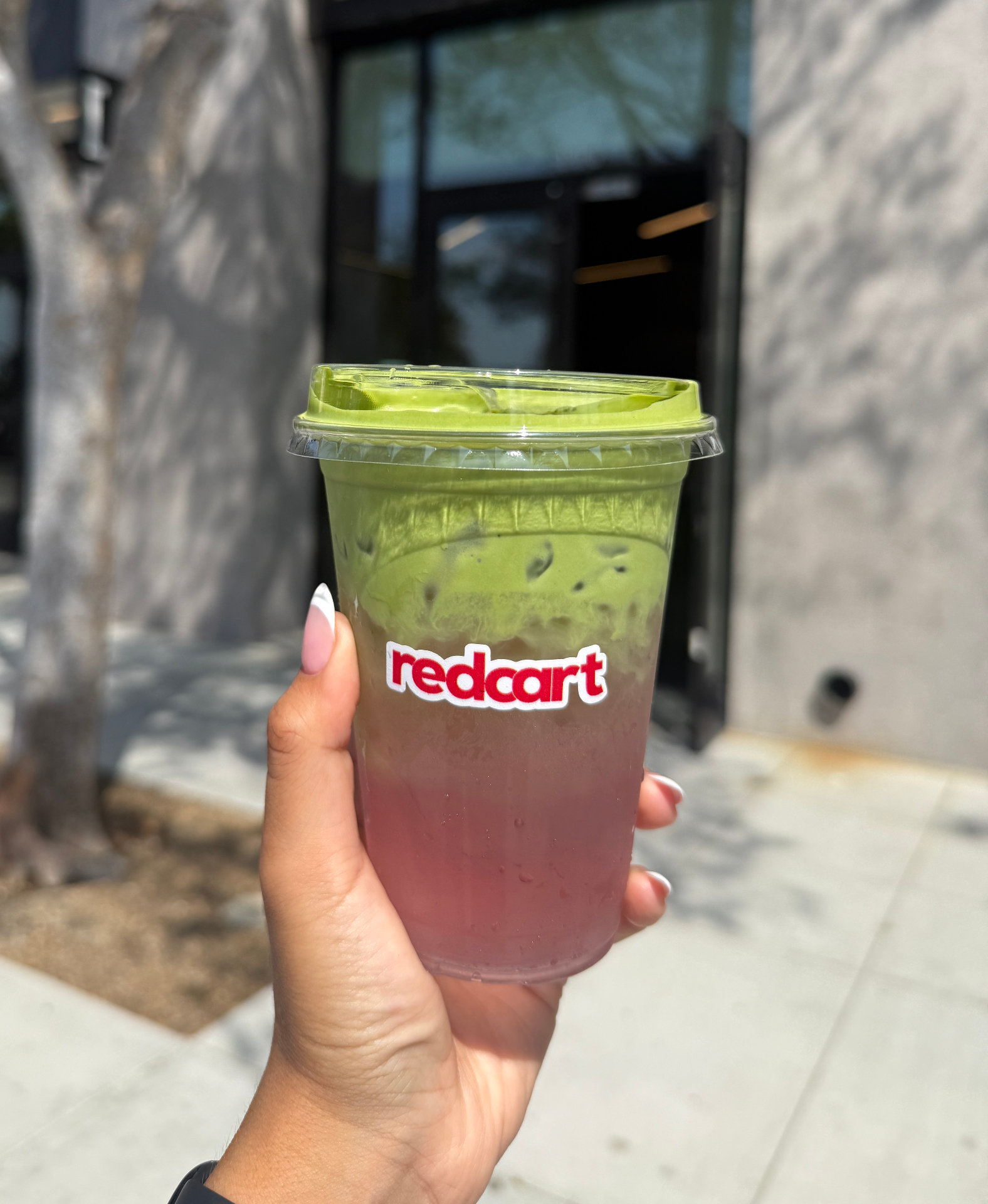 Coconut Cloud Matcha in a Redcart branded cup