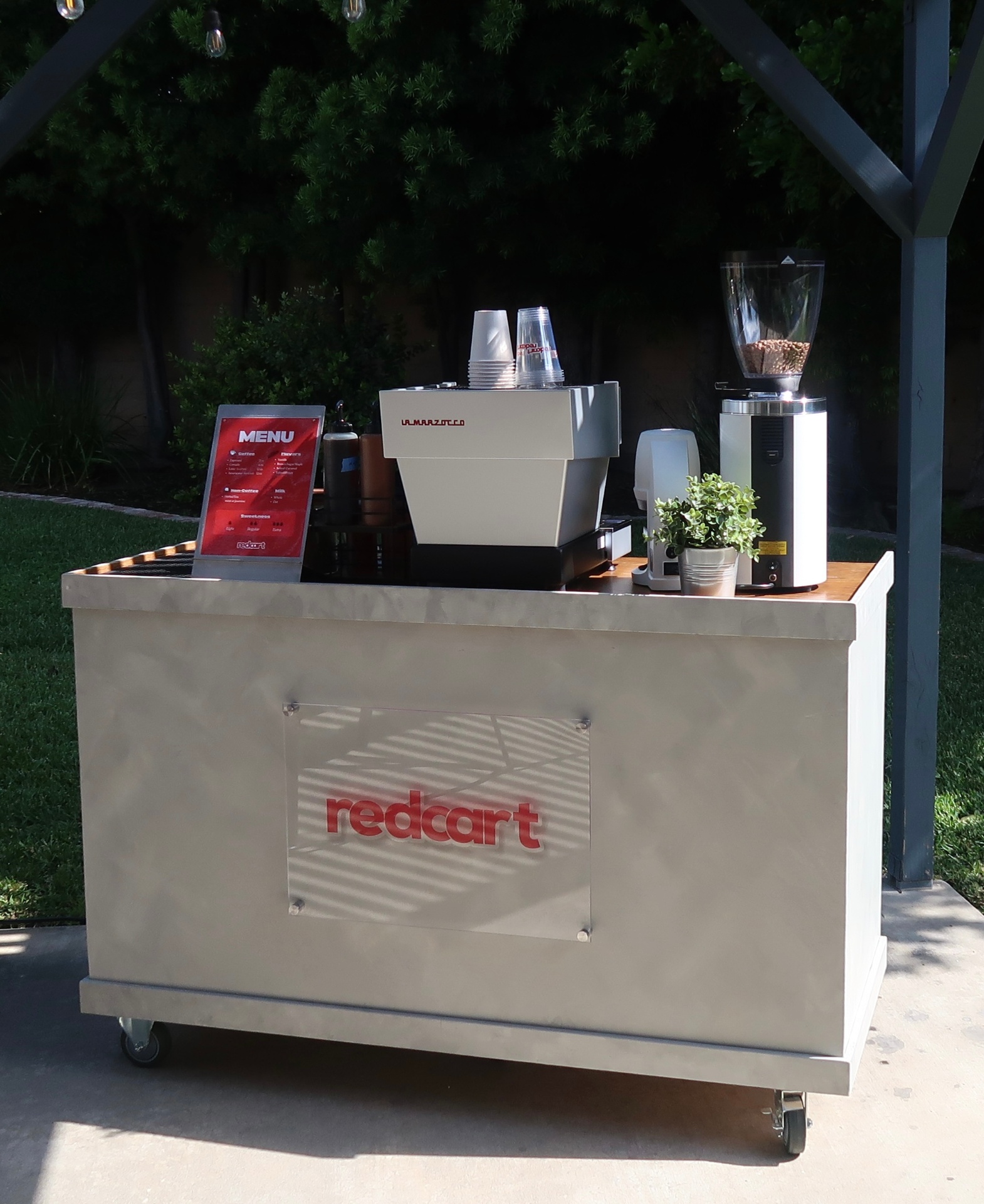 The Redcart Coffee mobile espresso cart with La Marzocco machine